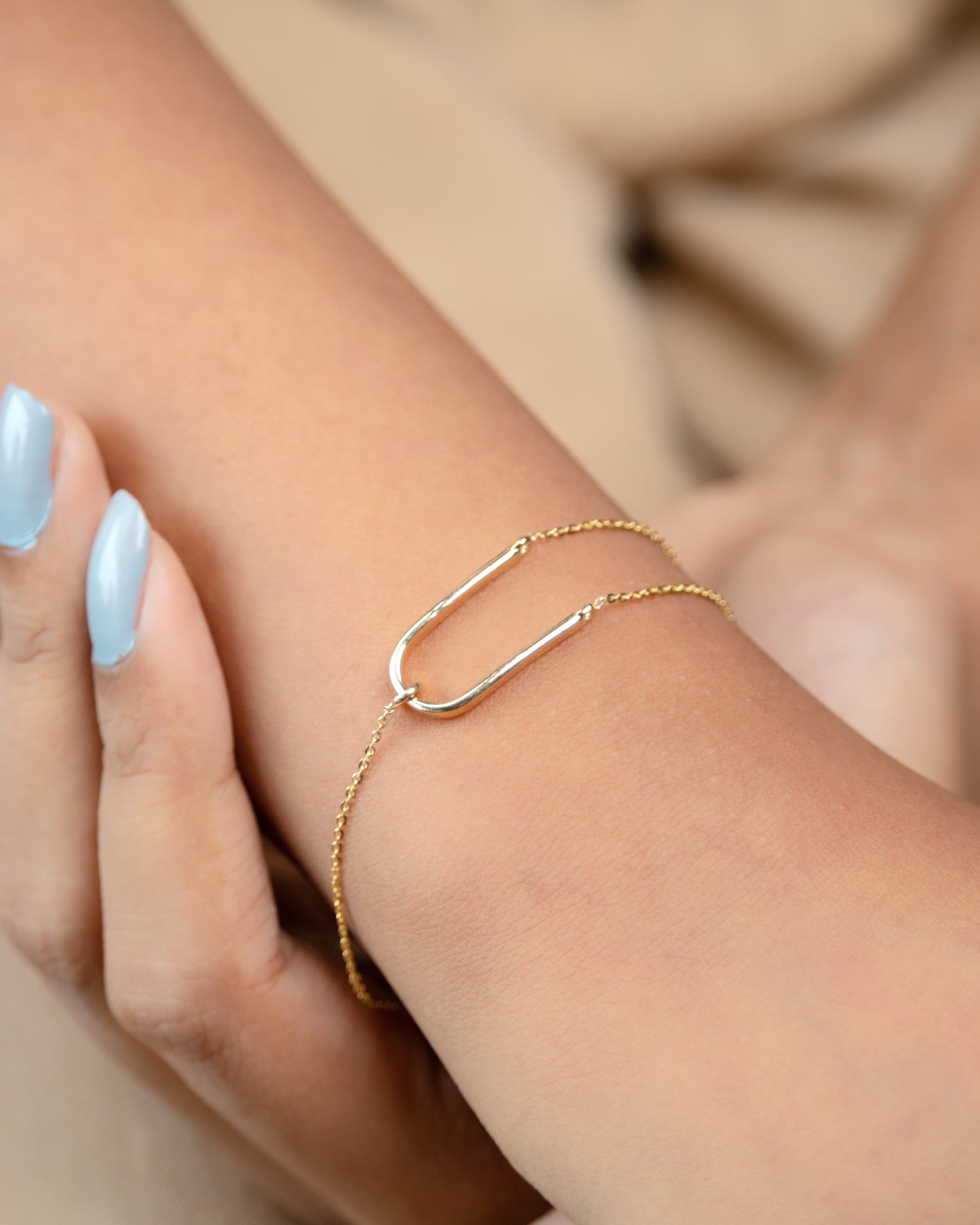 18 kt gold U Double Look Bracelet, The chic and versatile style makes it suitable for any occasion  from office wear to casual outings. Gifts for her to make her smile under the budget of Rs. 30,000.