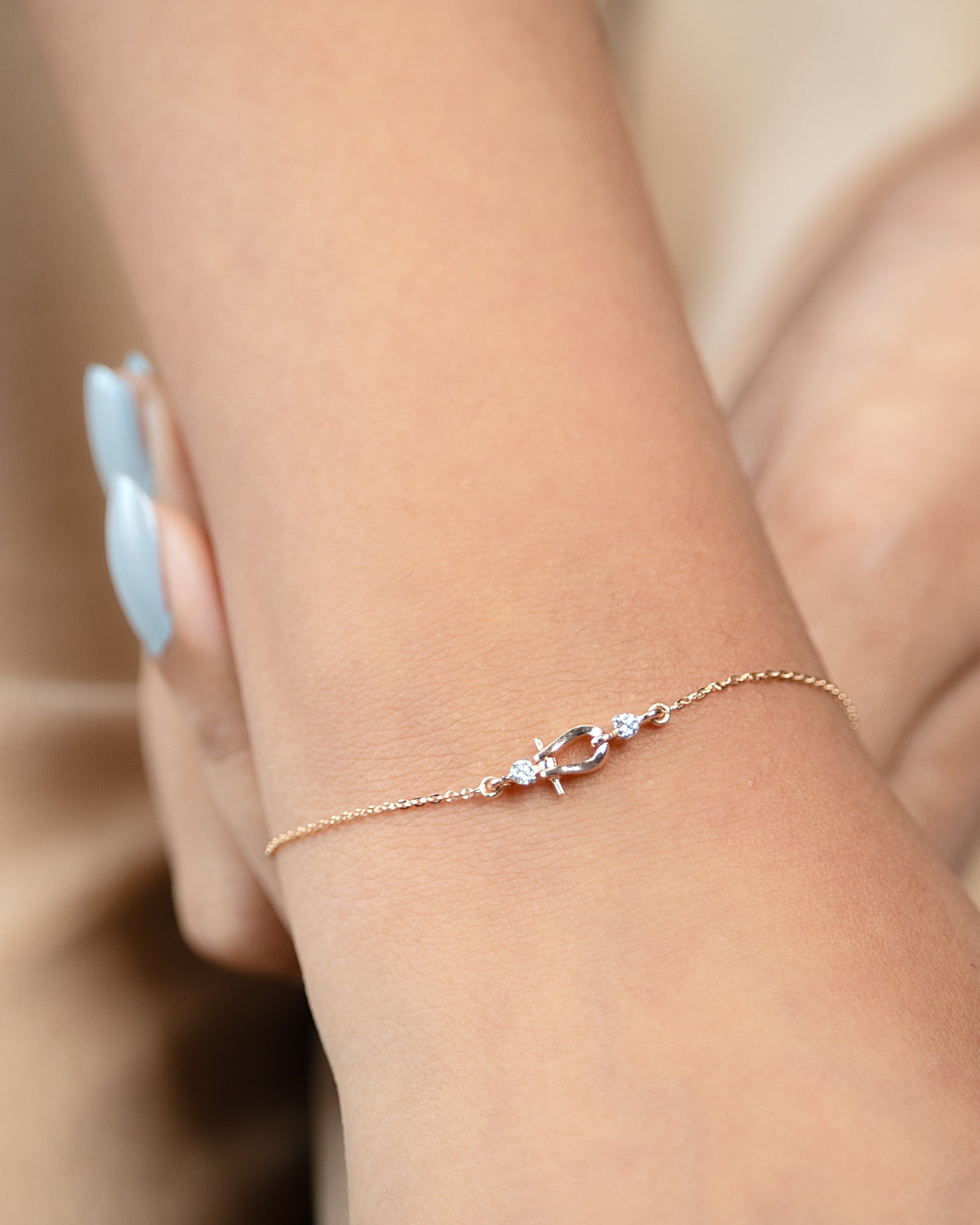 18kt gold horse shoe diamond bracelet for everyday wear for women in an affordable price of Under Rs. 30,000. Elevate your style with this versatile accessory from work wear to casual outings. A thoughtful jewellery gift piece for her.