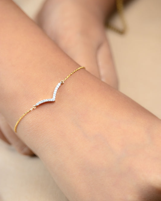 Elevate your wrist with our Stylish Diamond Bracelet, crafted in luxurious 18kt gold. Perfect for daily wear for women. Gift ideas for her. Explore our jewellery collection under Rs. 30,000, perfect for your work wear edit.