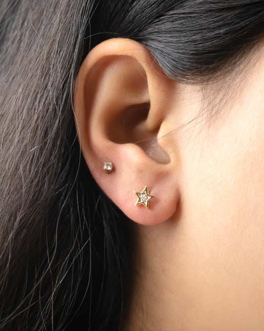 Star Diamond Earrings crafted in radiant 18kt gold under Rs. 30,000. Ideal for daily wear for women. A thoughtful gift for her that combines elegance with everyday practicality.