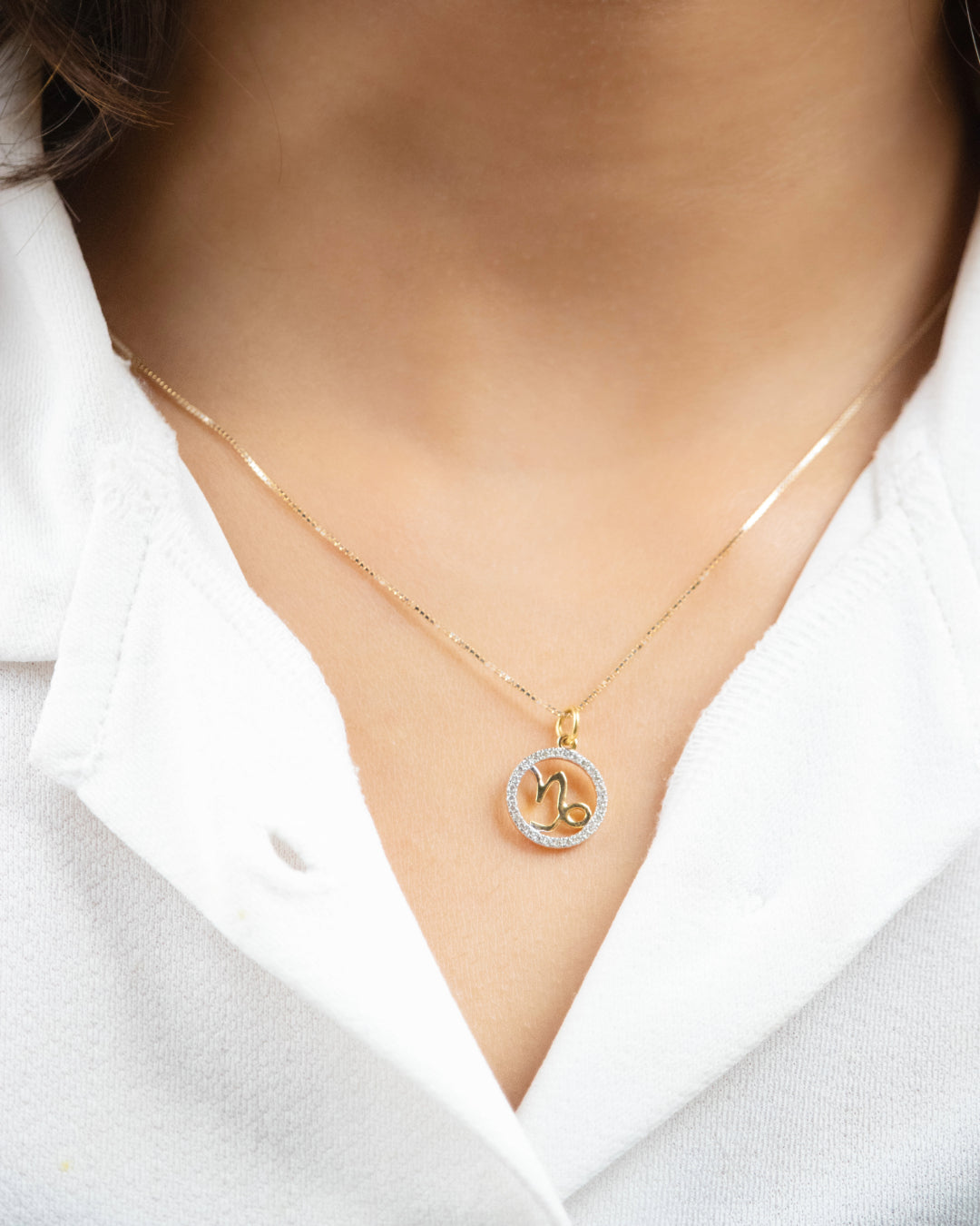 Zodiac Diamond Charm made with 18 kt Gold. Personalized luxury for everyday wear for Women. This celestial-inspired charm adds a touch of elegance to any outfit. Gifting ideas for her from our affordable luxury collection under 30,000.