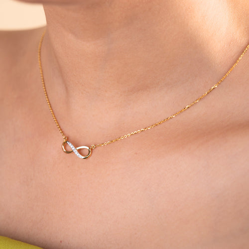Infinity Diamond Necklace in 18kt gold featuring VVS diamonds, perfect for everyday wear or gifting. Caratly luxury jewelry under 30k.