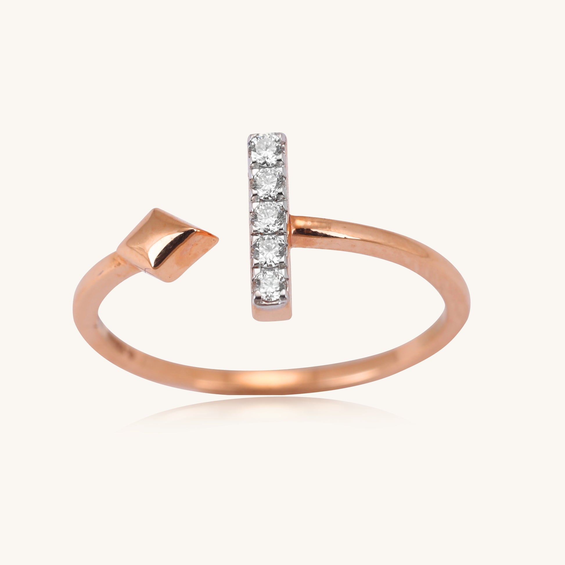 Elevate your everyday style with our 18kt gold Linear Diamond ring. Designed for versatility, this minimalist yet elegant ring seamlessly transitions from work to weekend, adding a touch of sophistication to any ensemble. Priced under Rs. 30,000, it makes a beautiful gifting idea for her. Embrace a casual yet refined look with this everyday wear edit. 
