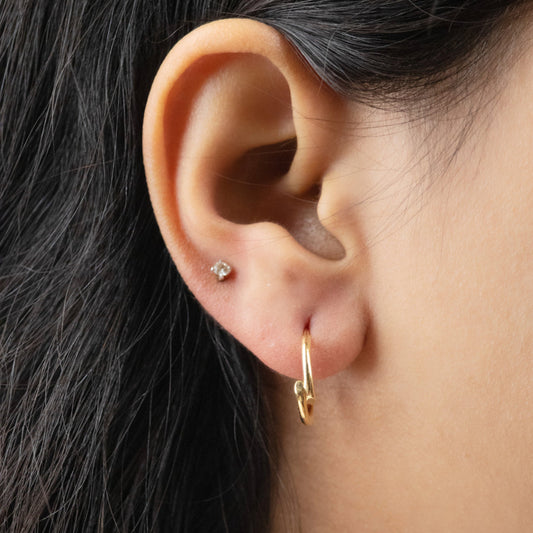Caratly 18kt gold Disarranged Gold Earring with abstract staggered open hoop design under Rs. 40,000