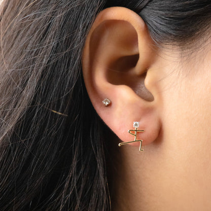 Caratly 18kt gold Human Diamond Earring with 0.10ct diamond accents in an abstract stick figure person design