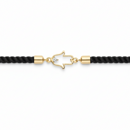 Black rope men's diamond bracelet with an 18kt gold hand amulet charm and diamond accent. A perfect gold gift for him under Rs. 15,000