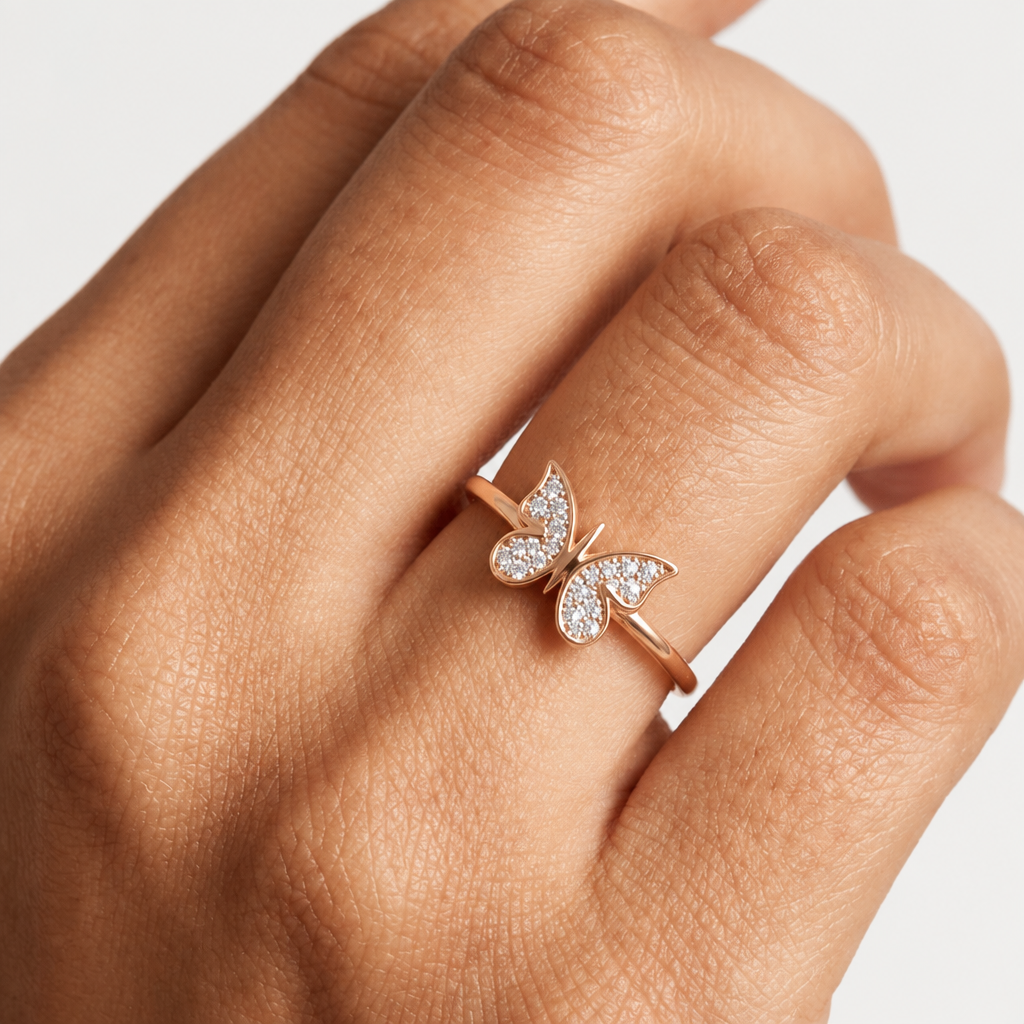 Rose gold ring shaped like a butterfly, fully paved with sparkling diamonds. Minimal gifts for her under Rs. 30,000