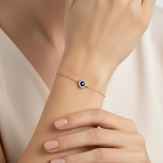 18kt gold Sway Evil Eye Bracelet with diamond halo. Premium price range under Rs. 50,000