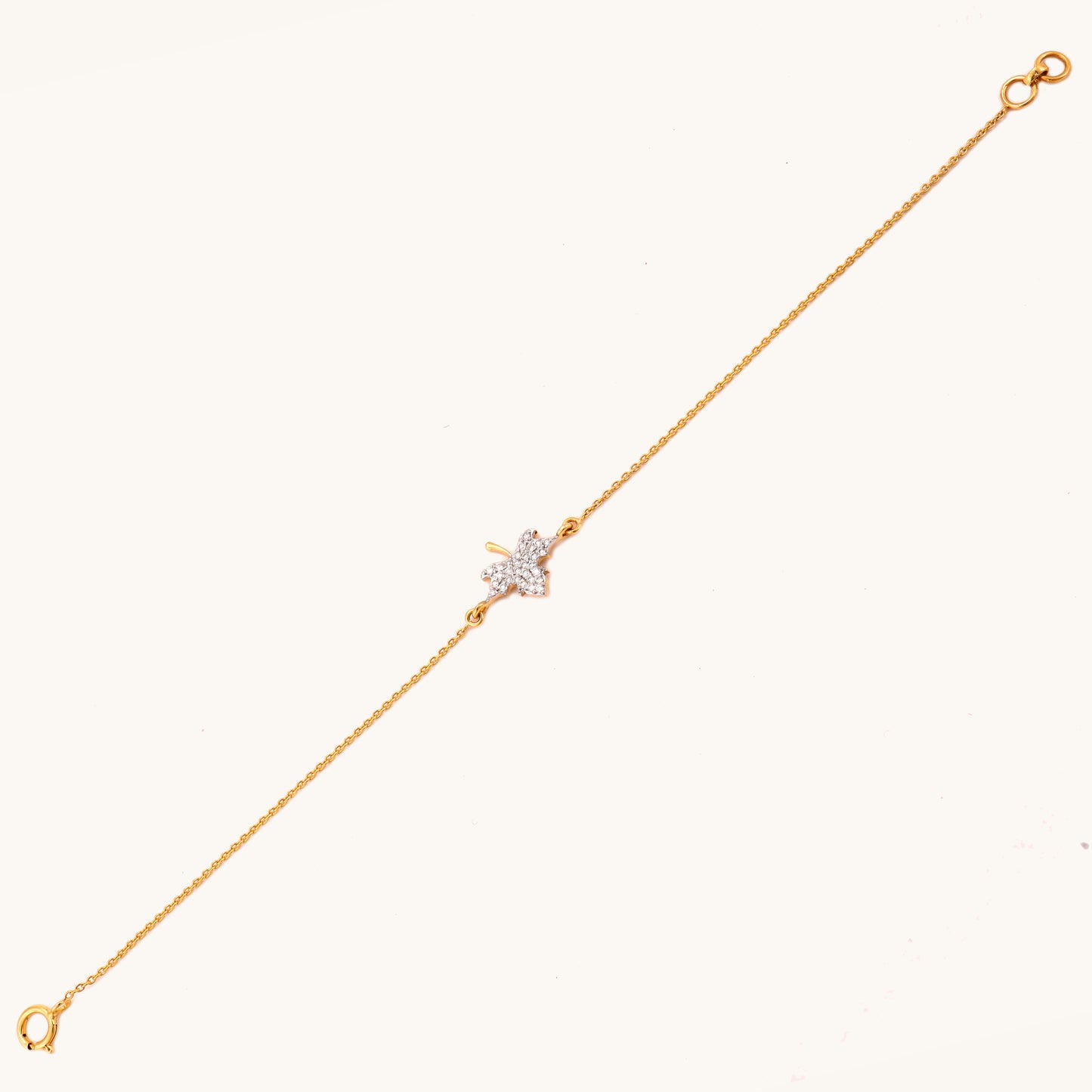 Caratly 18kt gold Maple Diamond Bracelet featuring a detailed maple leaf charm fully encrusted with pave diamonds. Minimal gift for her under Rs. 30,000