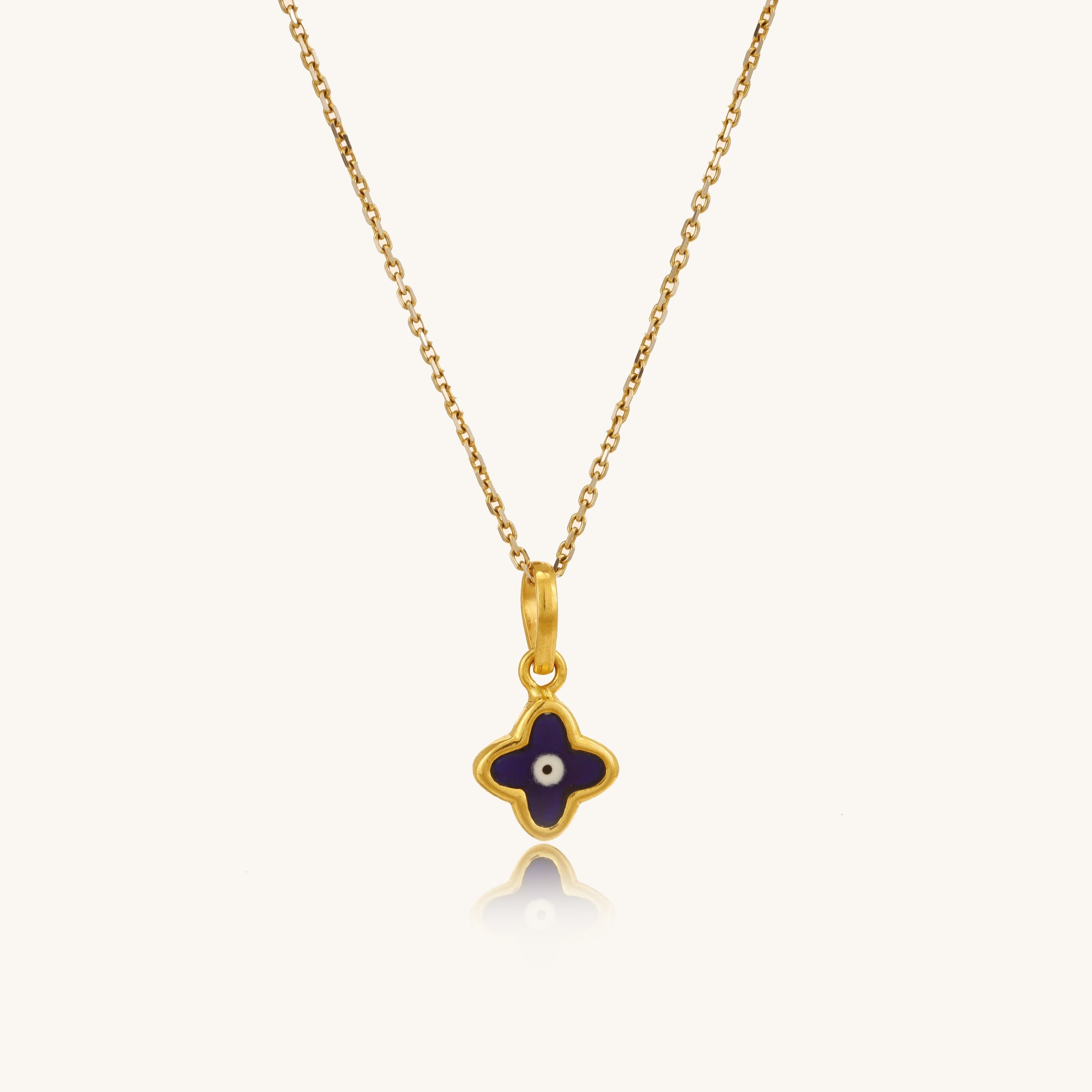Caratly 18kt gold Baby Evil Eye Pendant featuring a tiny dark blue enamel clover-shaped evil eye charm under Rs. 15,000 
