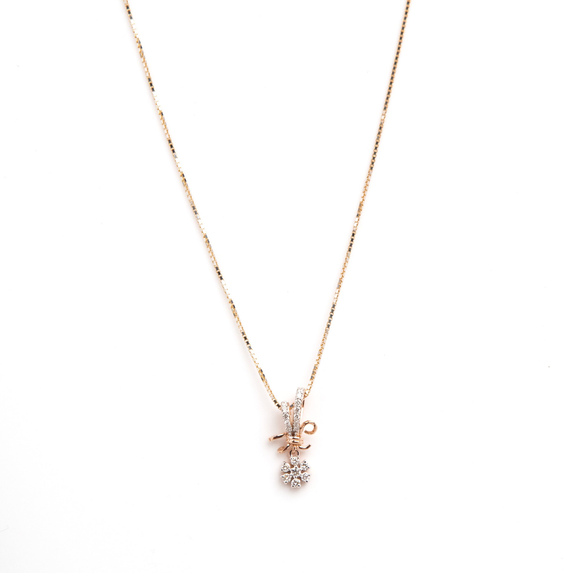 Caratly 18kt gold Bouquet Diamond Pendant with 0.14ct diamond flower cluster and gold ribbon tie design under Rs. 30,000