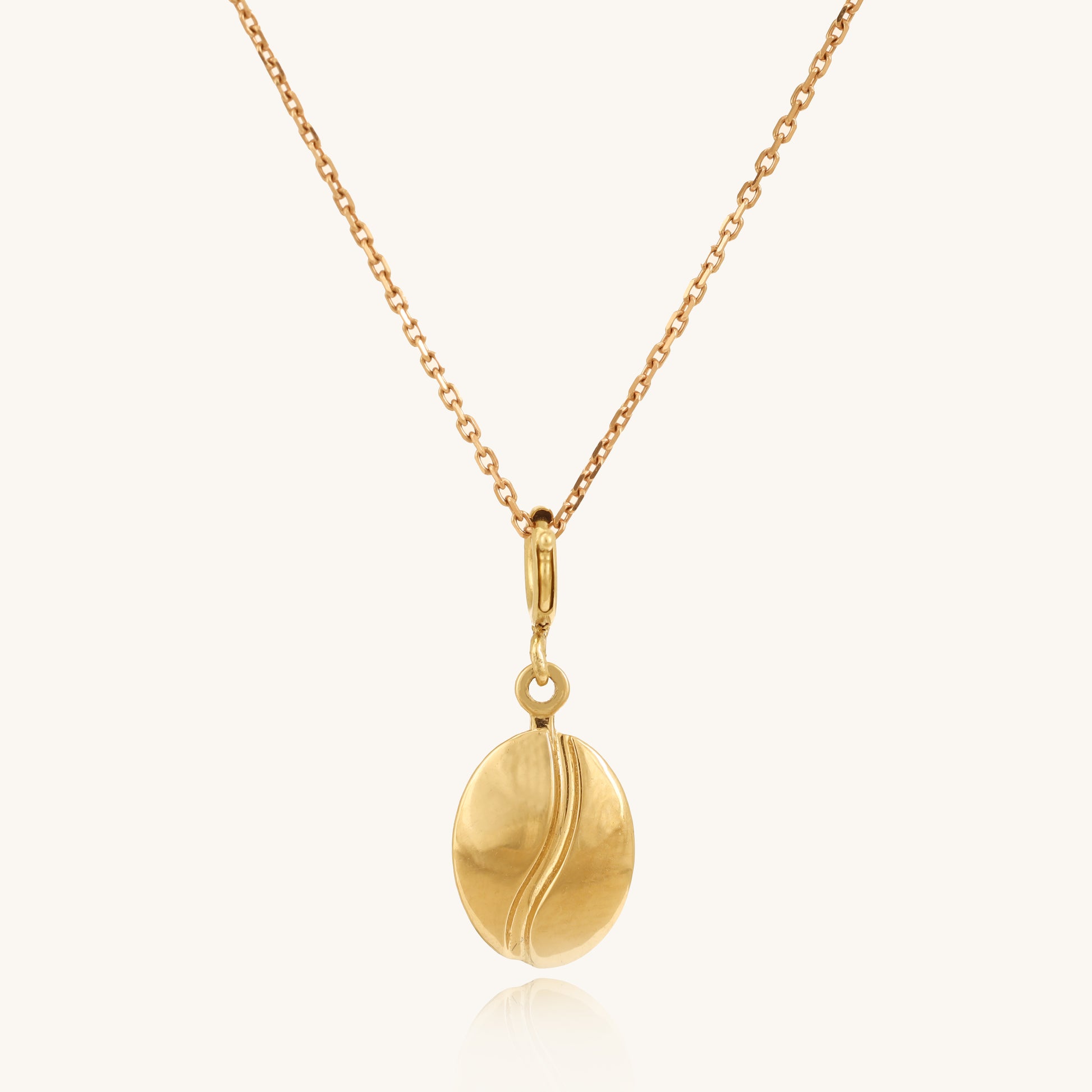 Caratly 18kt gold Coffee Gold Charm featuring a small, polished solid gold coffee bean motif hanging from a delicate chain. A perfect minimal affordable gift for her under Rs. 20,000