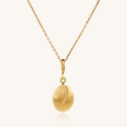 Caratly 18kt gold Coffee Gold Charm featuring a small, polished solid gold coffee bean motif hanging from a delicate chain. A perfect minimal affordable gift for her under Rs. 20,000