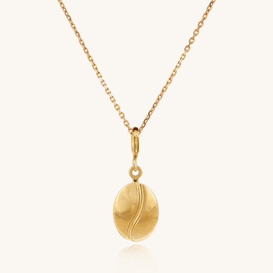 Caratly 18kt gold Coffee Gold Charm featuring a small, polished solid gold coffee bean motif hanging from a delicate chain. A perfect minimal affordable gift for her under Rs. 20,000