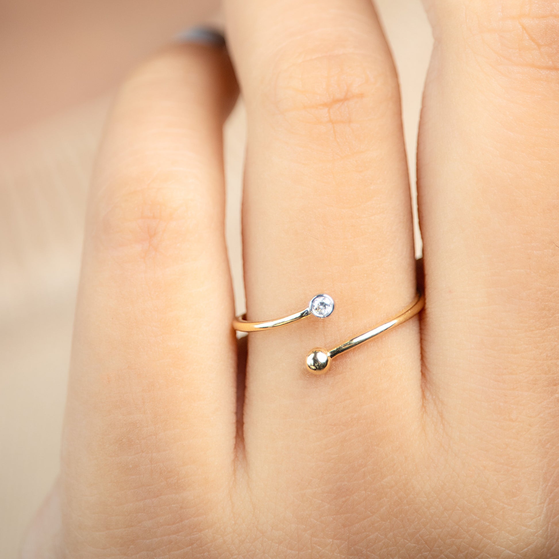 Caratly 18kt gold Crossover Diamond Ring with 0.03ct diamond and gold bead open bypass design under Rs. 15,000