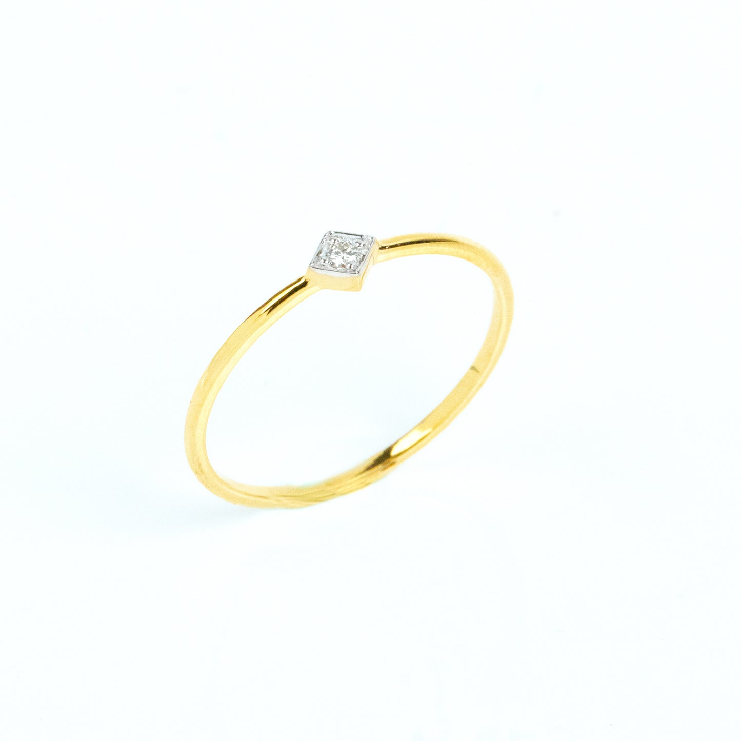 Caratly 18kt gold Diamond Basic Ring with 0.02ct solitaire diamond in a square bezel setting on a thin band, perfect minimal design for gifting under 15k