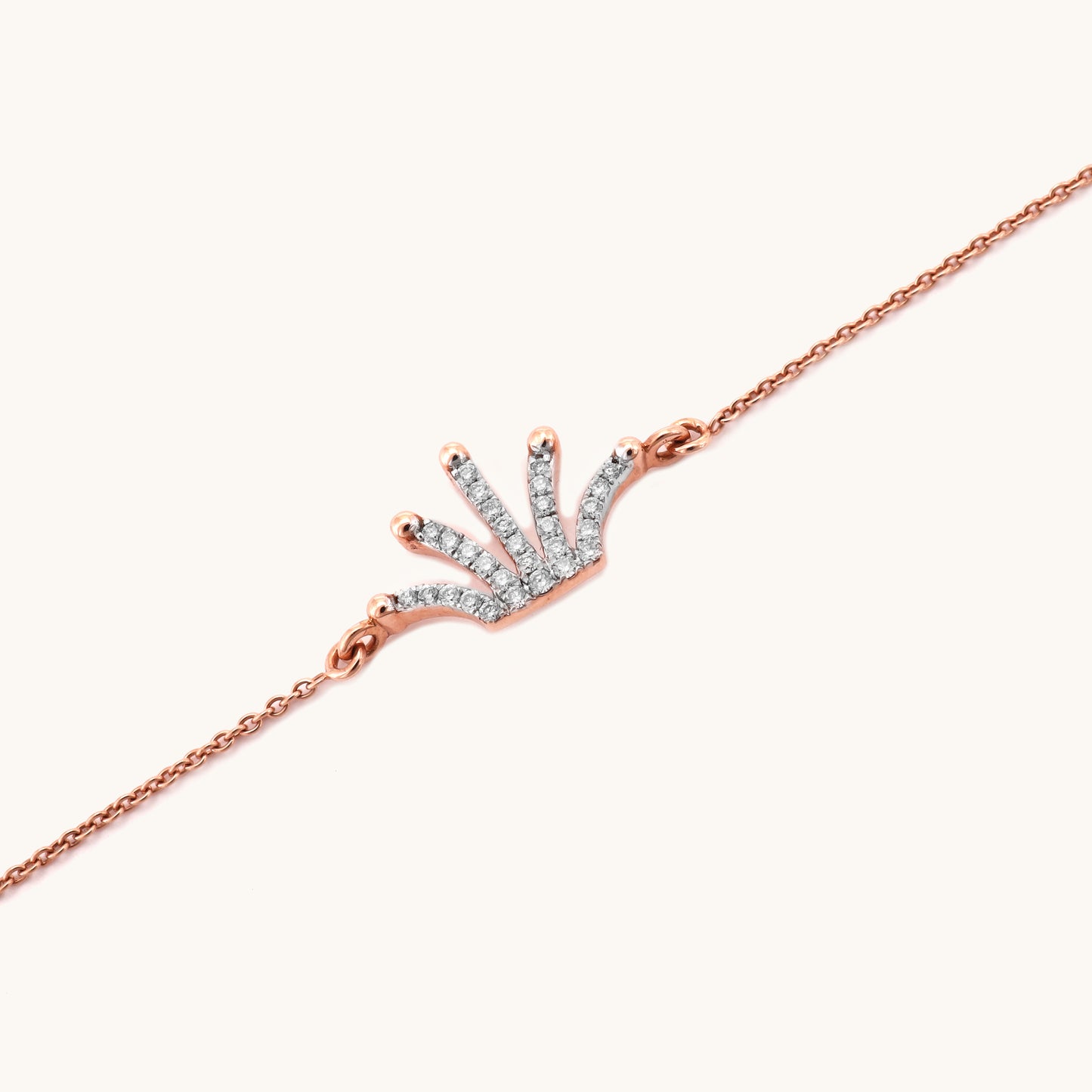 Caratly 18kt gold Diamond Crown Bracelet featuring a multi-point curved tiara charm fully set with pave diamonds. Minimal gifts for her under Rs. 40,000