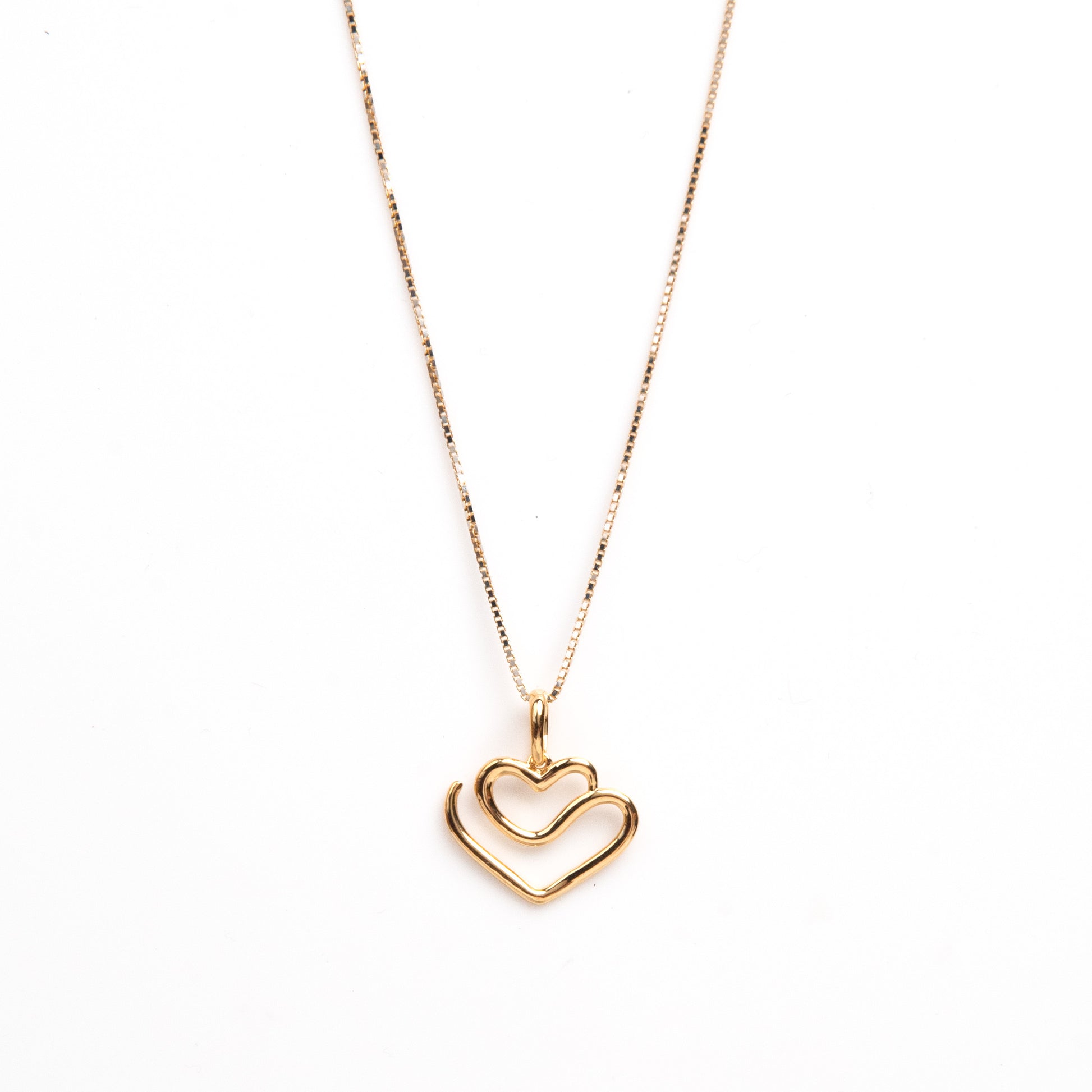 Caratly 18kt gold Draw Heart Pendant with continuous line open heart outline design under RS. 15,000