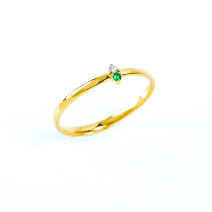 Caratly 18kt gold Emerald Basic Ring with green emerald and 0.01ct diamond accent on a thin minimalist band under Rs. 15,000