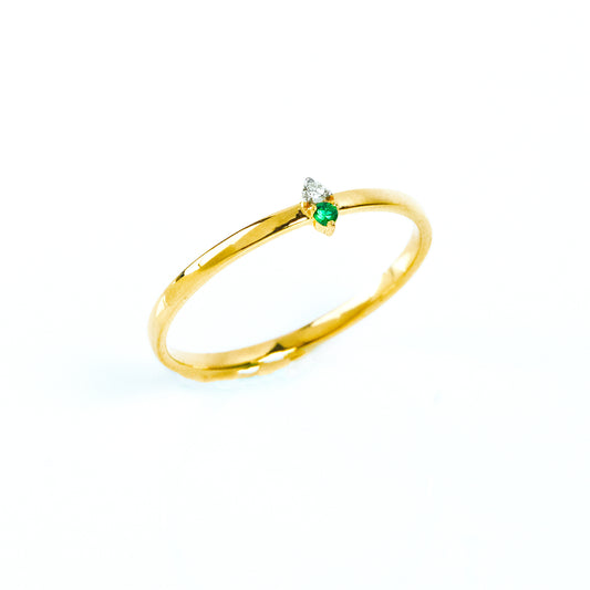 Caratly 18kt gold Emerald Basic Ring with green emerald and 0.01ct diamond accent on a thin minimalist band under Rs. 15,000