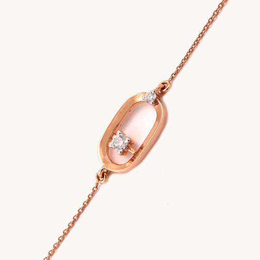 Caratly 18kt gold Encircle Diamond Bracelet featuring an elongated open oval link with a single floating diamond in the center and side accents. Best everyday jewellery gift for her under Rs. 45,000