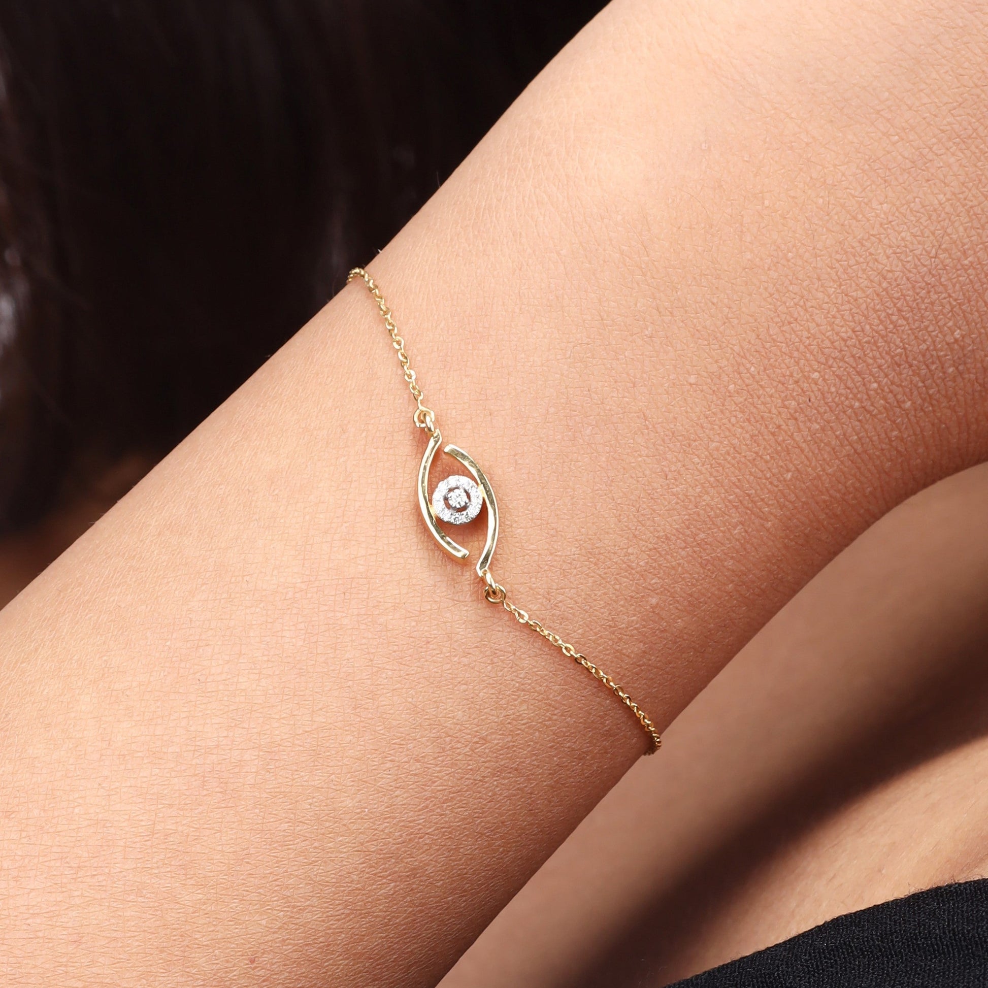 Caratly 18kt gold Evil Eye Diamond Bracelet featuring a delicate chain and an open eye-shaped charm with a 0.04ct central diamond accent under Rs. 30,000