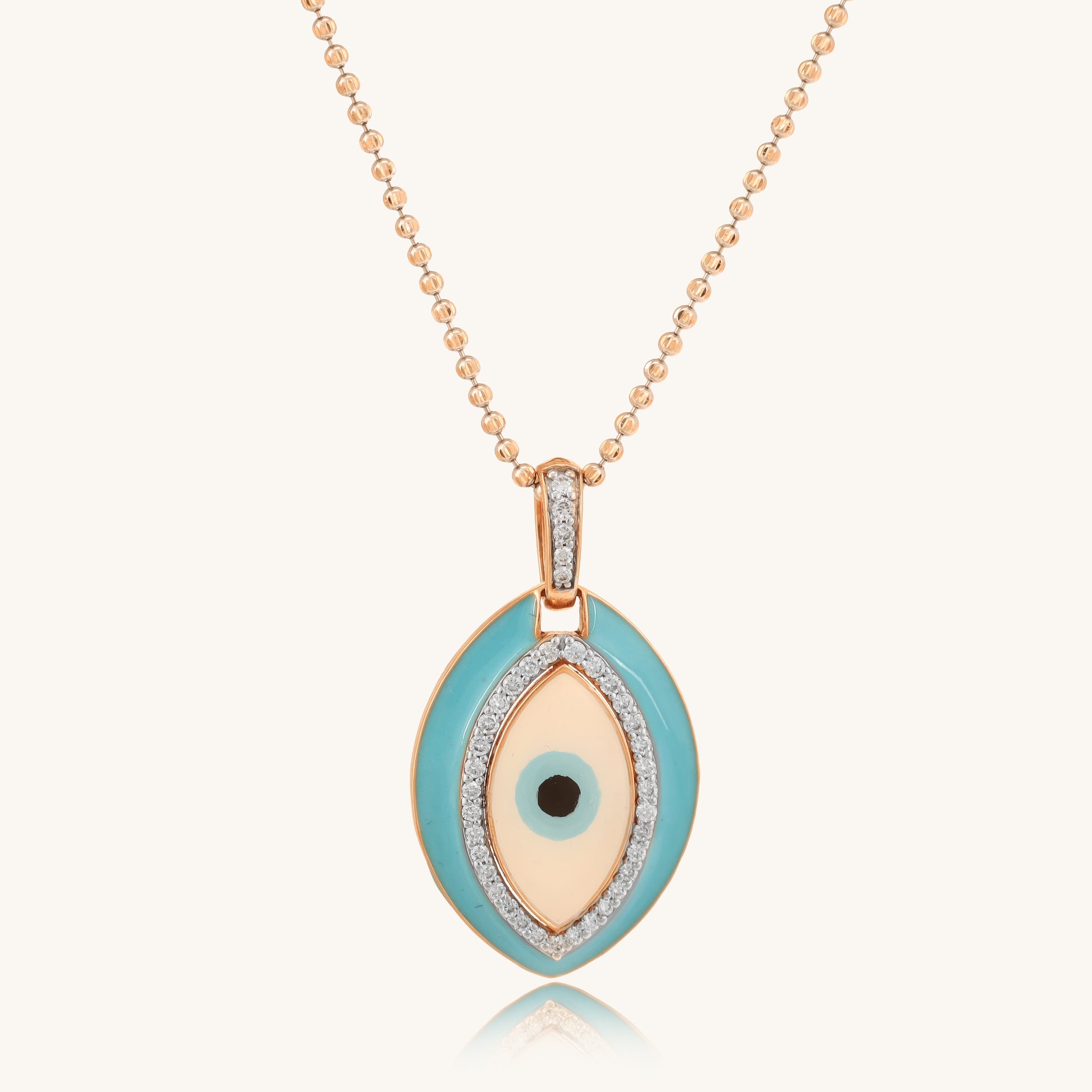 Caratly 18kt gold Evil Eye Pendant featuring a large turquoise enamel oval charm bordered and centered with pave diamonds under Rs. 40,000