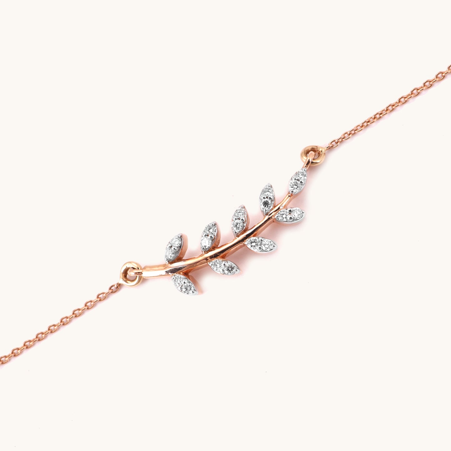 Caratly 18kt gold Fern Diamond Bracelet featuring a curved botanical branch with leaves set with pave diamonds. A minimal gift for her Under Rs. 40,000