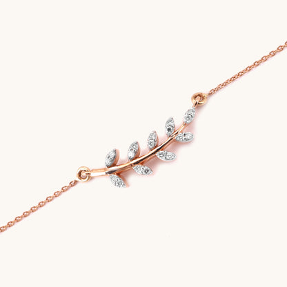 Caratly 18kt gold Fern Diamond Bracelet featuring a curved botanical branch with leaves set with pave diamonds. A minimal gift for her Under Rs. 40,000