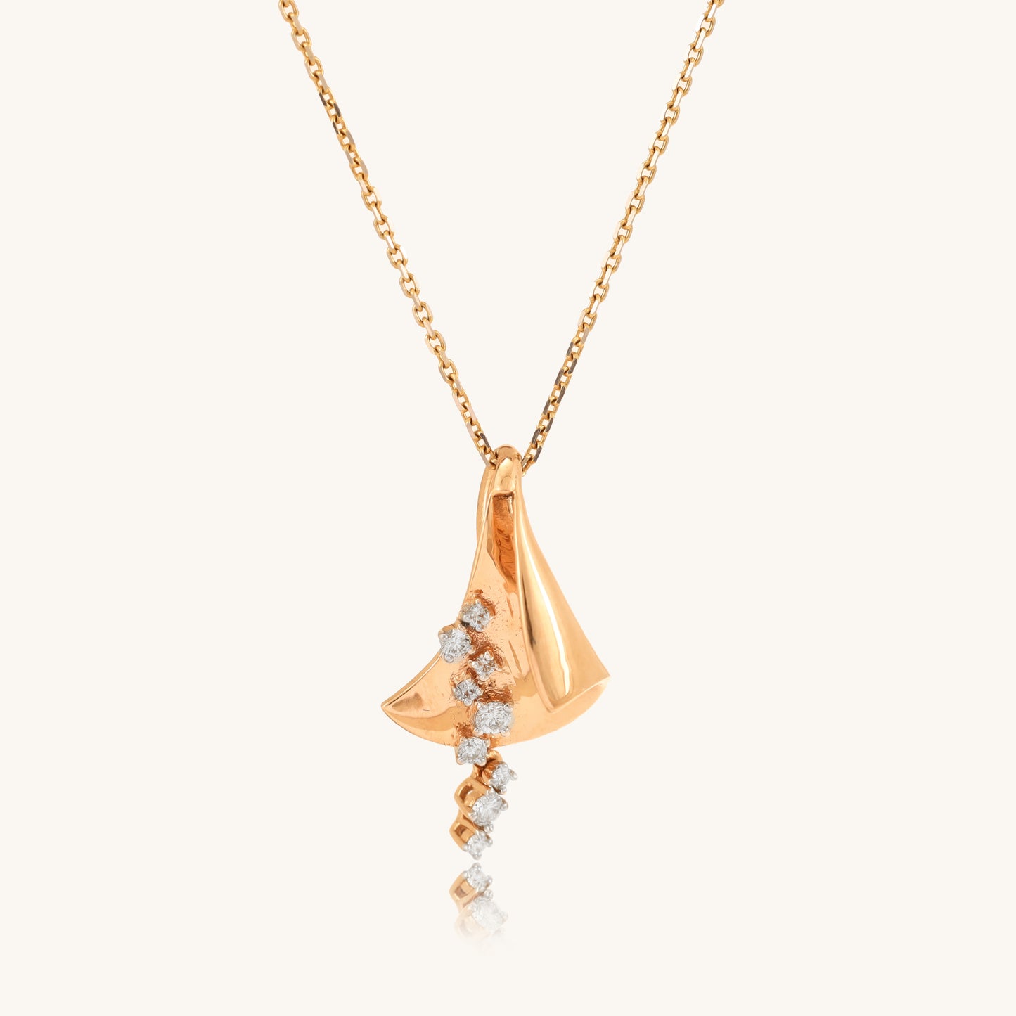 Caratly 18kt gold Flowing Diamond Pendant featuring a modern abstract wavy gold shape accented with a cascading vertical line of pave diamonds. Perfect Gift for her under Rs. 60,000
