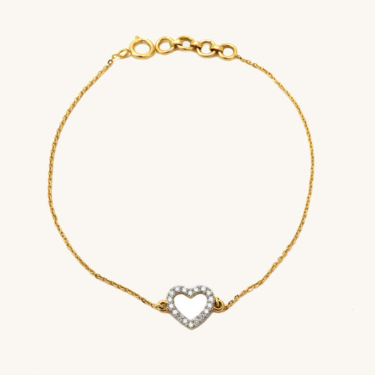 Caratly 18kt gold Heart Diamond Bracelet with 0.13ct diamond pave open heart outline charm on a delicate chain under Rs. 40,000