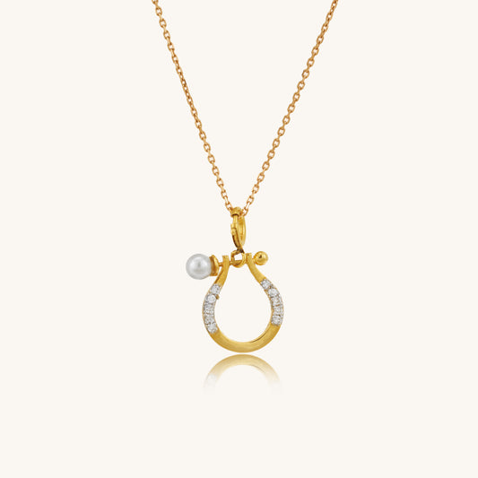 Caratly 18kt gold Horse shoe Pendant featuring a small lucky horseshoe motif with pave diamonds and a single pearl accent. Perfect gift for her under Rs. 20,000