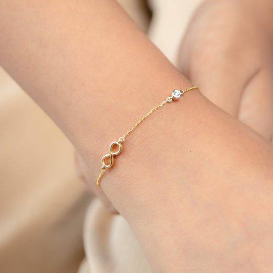 Caratly 18kt gold Infinity Diamond Bracelet with 0.06ct diamond station design for women 1.61g under Rs. 40,000