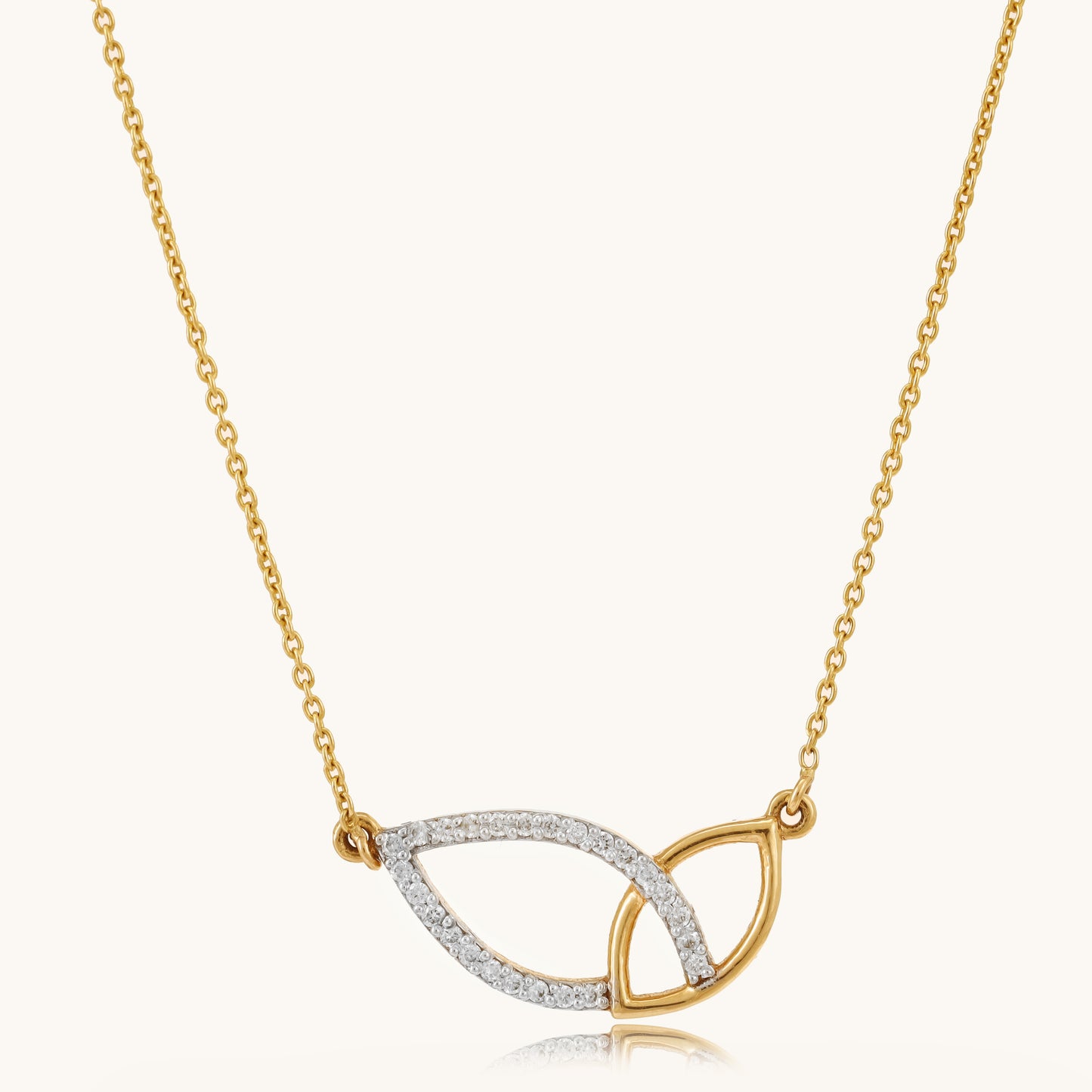 Caratly 18kt gold Leafy Diamond Necklace featuring two sideways overlapping open leaf shapes, one plain gold and one set with diamonds under Rs. 60,000