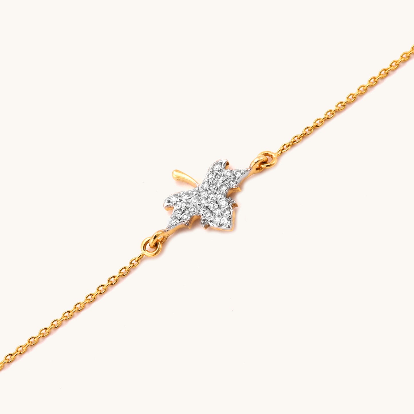 Caratly 18kt gold Maple Diamond Bracelet featuring a detailed maple leaf charm fully encrusted with pave diamonds. Minimal gift for her under Rs. 30,000