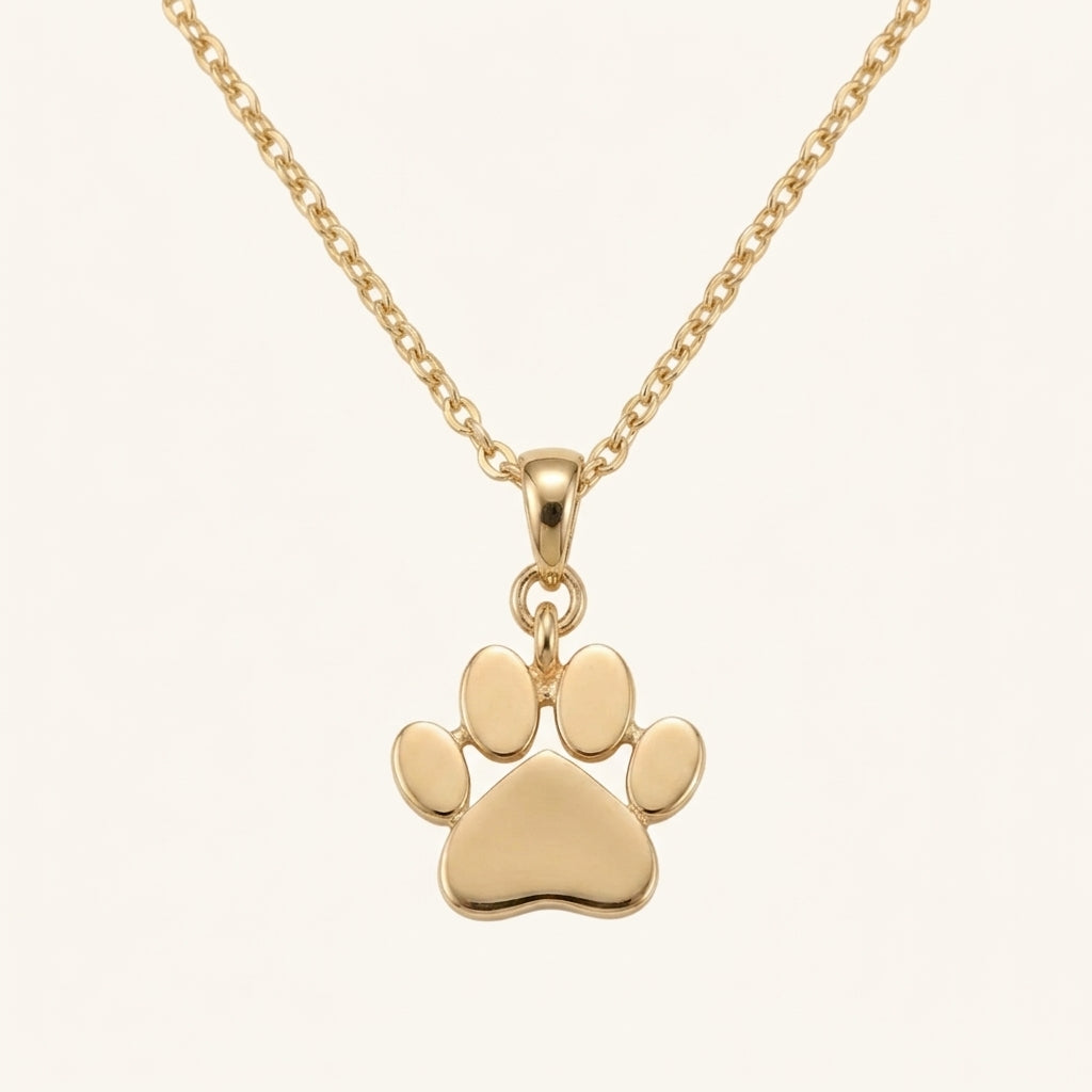 Caratly 18kt gold Paw Gold Pendant featuring a small, polished solid gold paw print charm on a delicate chain under Rs. 15,000
