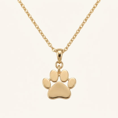 Caratly 18kt gold Paw Gold Pendant featuring a small, polished solid gold paw print charm on a delicate chain under Rs. 15,000