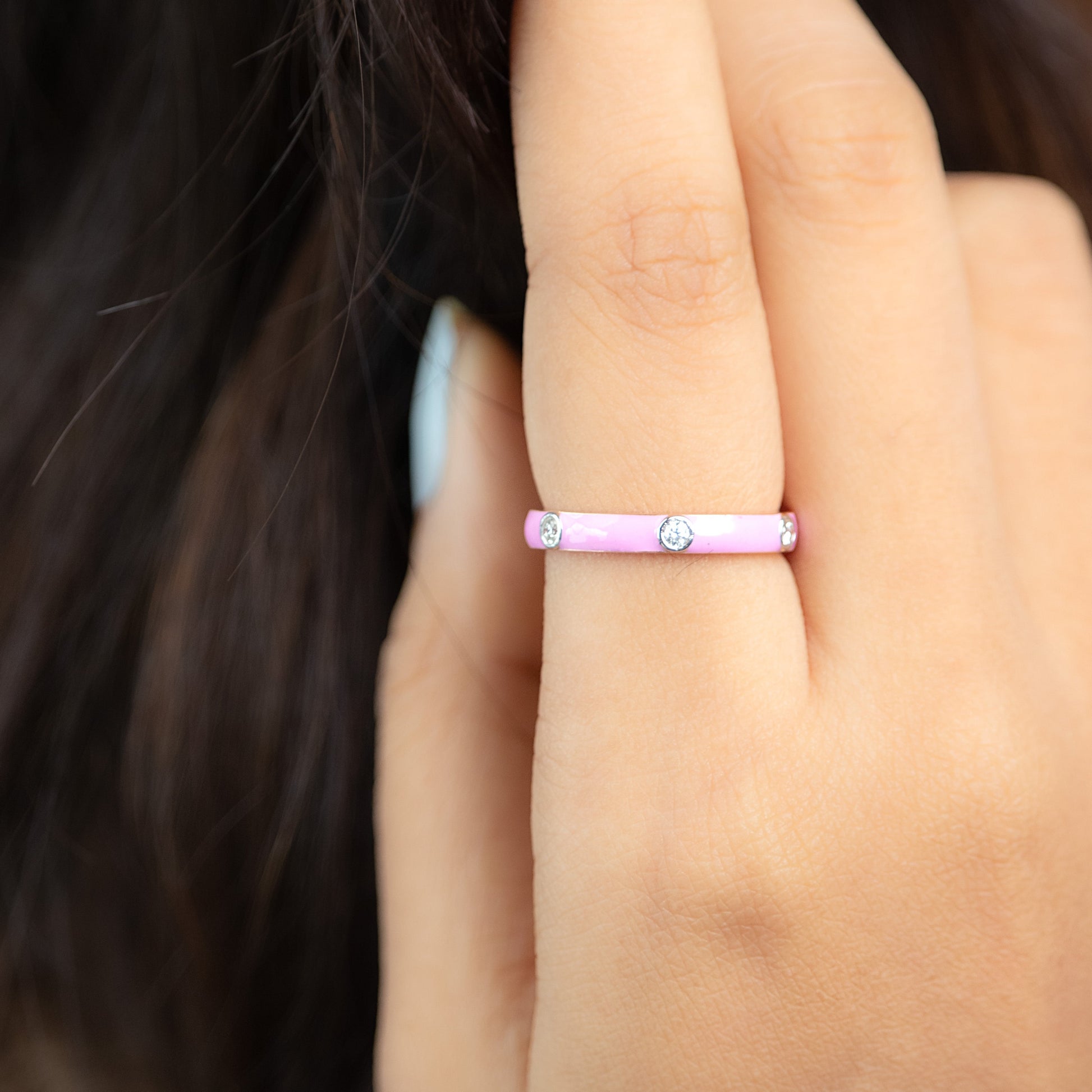 Caratly 18kt gold Pink Band Ring with pink enamel surface and 0.17ct flush set diamond accents under 50,000