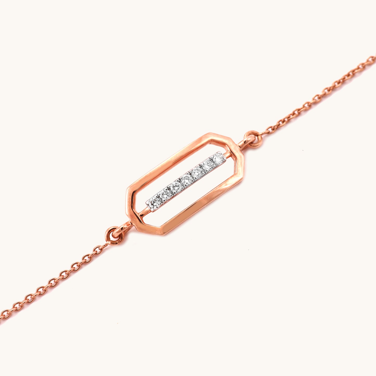 Caratly 18kt gold Quad Diamond Bracelet featuring an open elongated geometric hexagon shape with a straight horizontal bar of diamonds in the center under Rs. 30,000