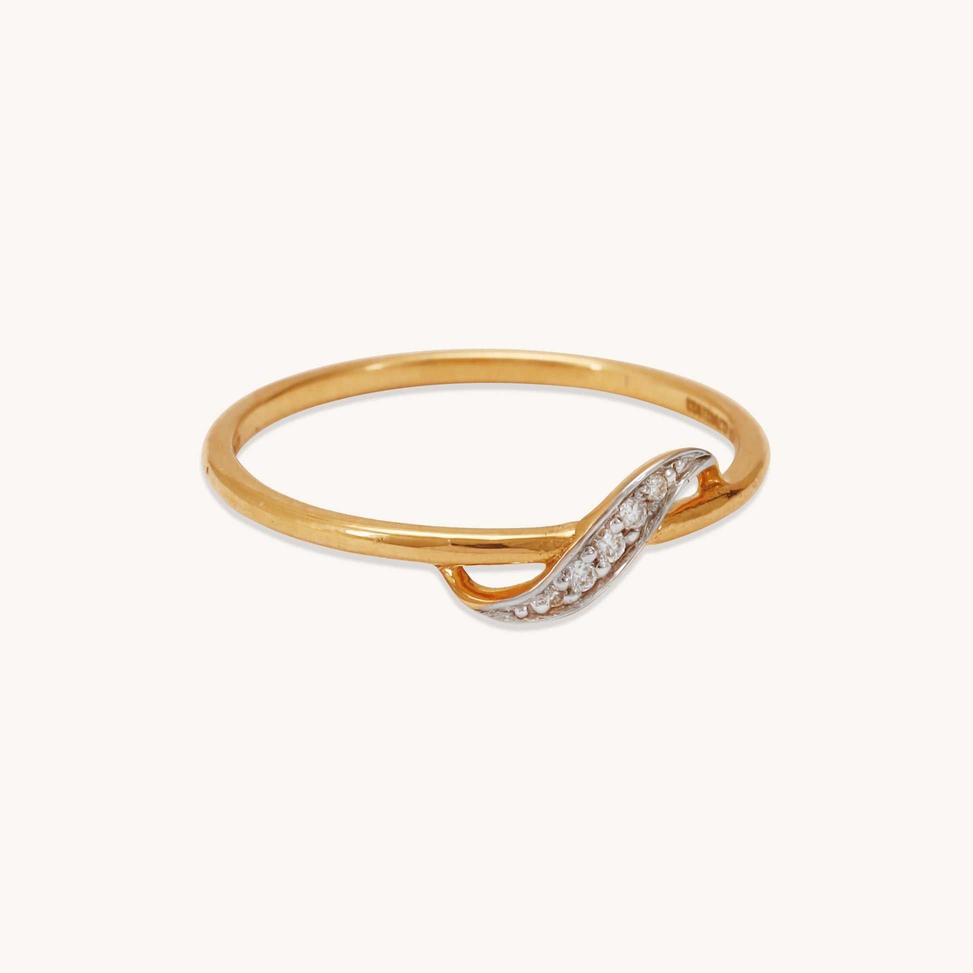 Caratly 18kt gold S Diamond Ring with 0.04ct diamond pave in a gentle S-wave band design under 20,000
