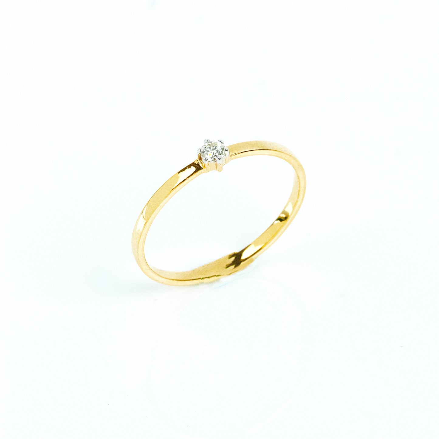 Caratly 18kt gold Solitaire Diamond Ring with 0.02ct round diamond prong set on a dainty minimalist band under Rs. 15,000