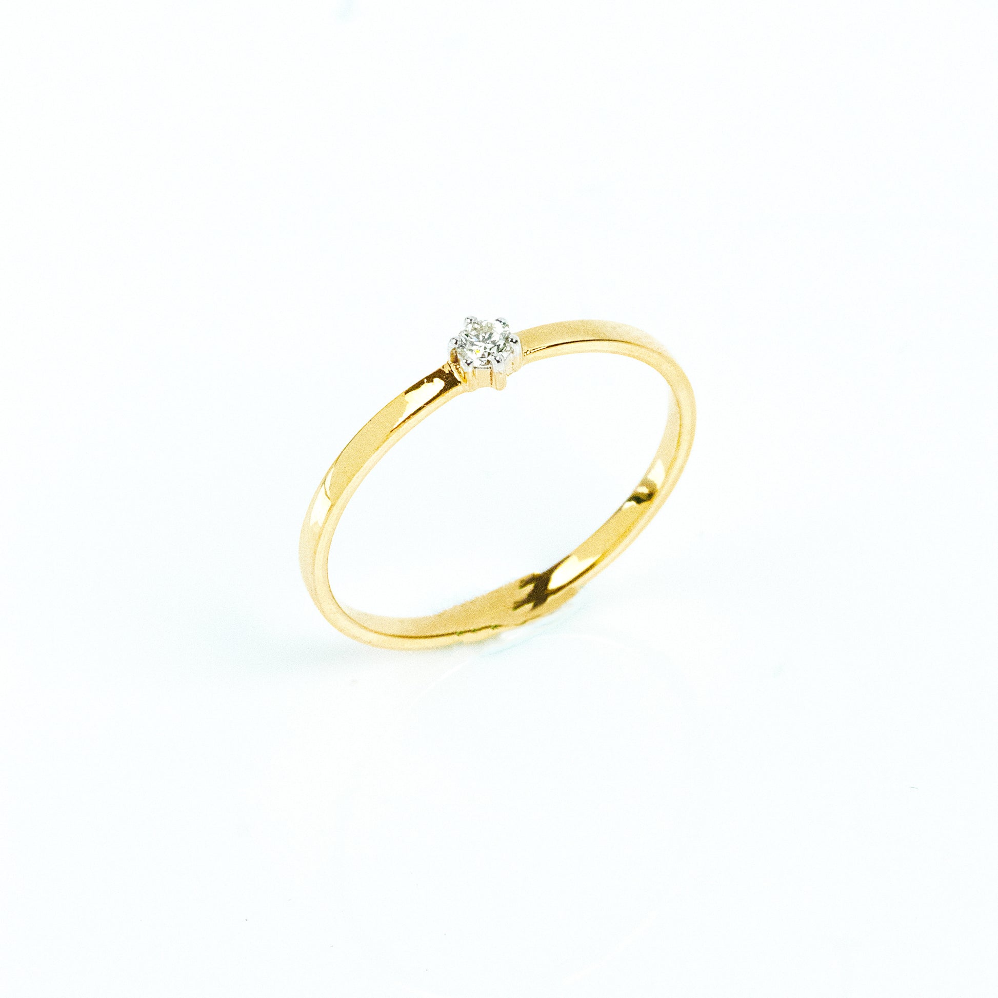 Caratly 18kt gold Solitaire Diamond Ring with 0.02ct round diamond prong set on a dainty minimalist band under Rs. 15,000