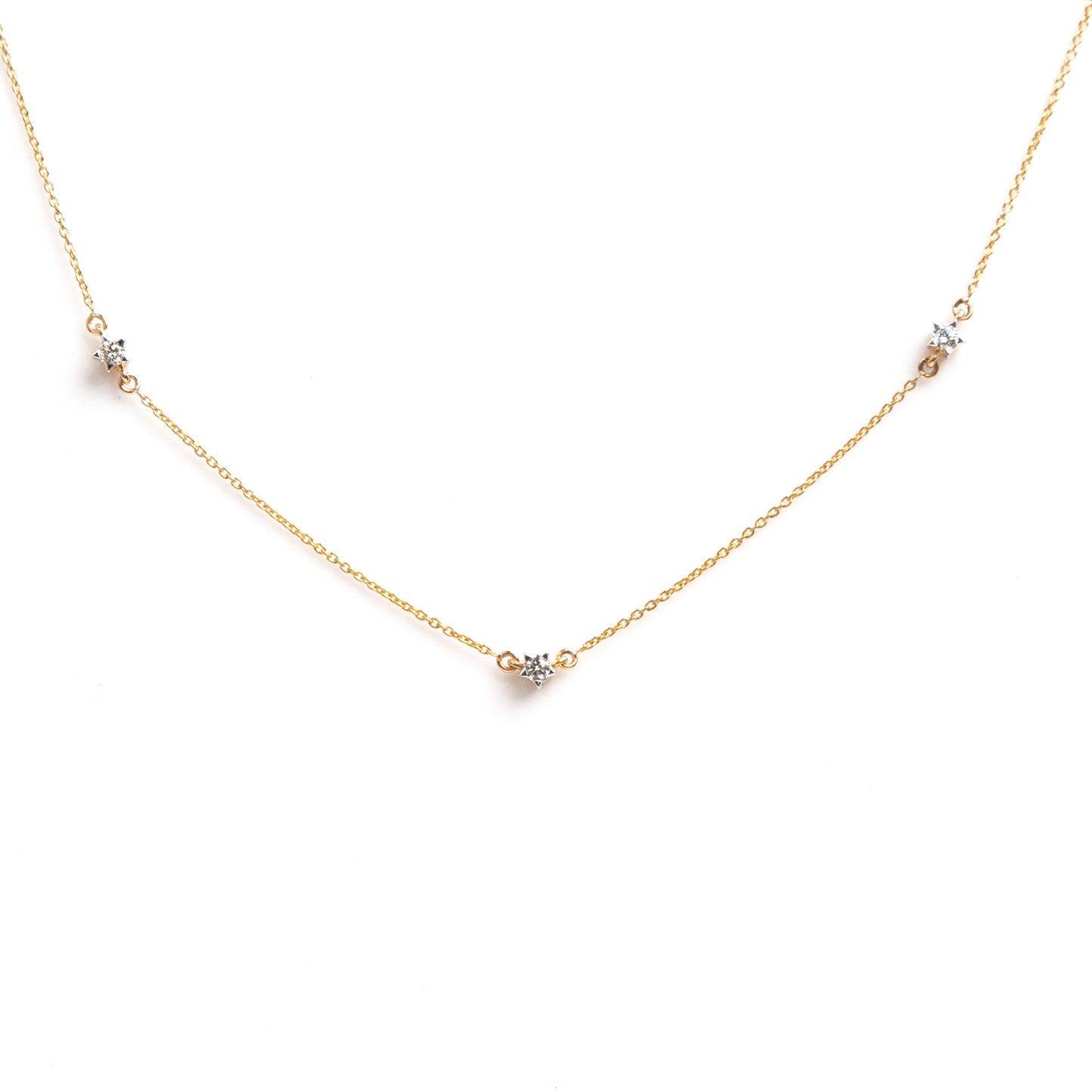 Caratly 18kt gold Tiny Stars Necklace with 0.16ct scattered diamond station design. Minimal gifts for her under 50,000