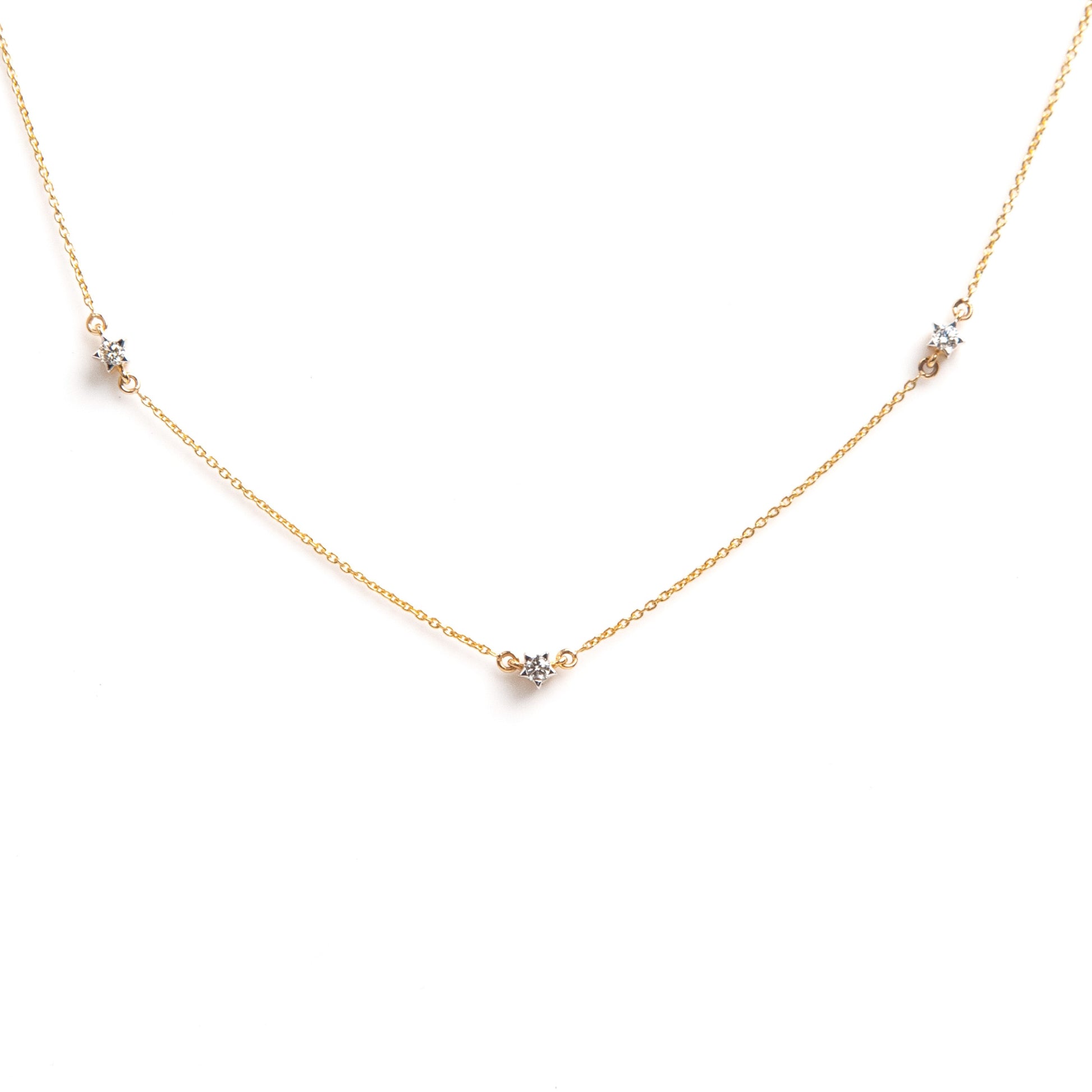 Caratly 18kt gold Tiny Stars Necklace with 0.16ct scattered diamond station design. Minimal gifts for her under 50,000
