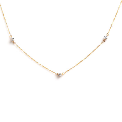 Caratly 18kt gold Tiny Stars Necklace with 0.16ct scattered diamond station design. Minimal gifts for her under 50,000