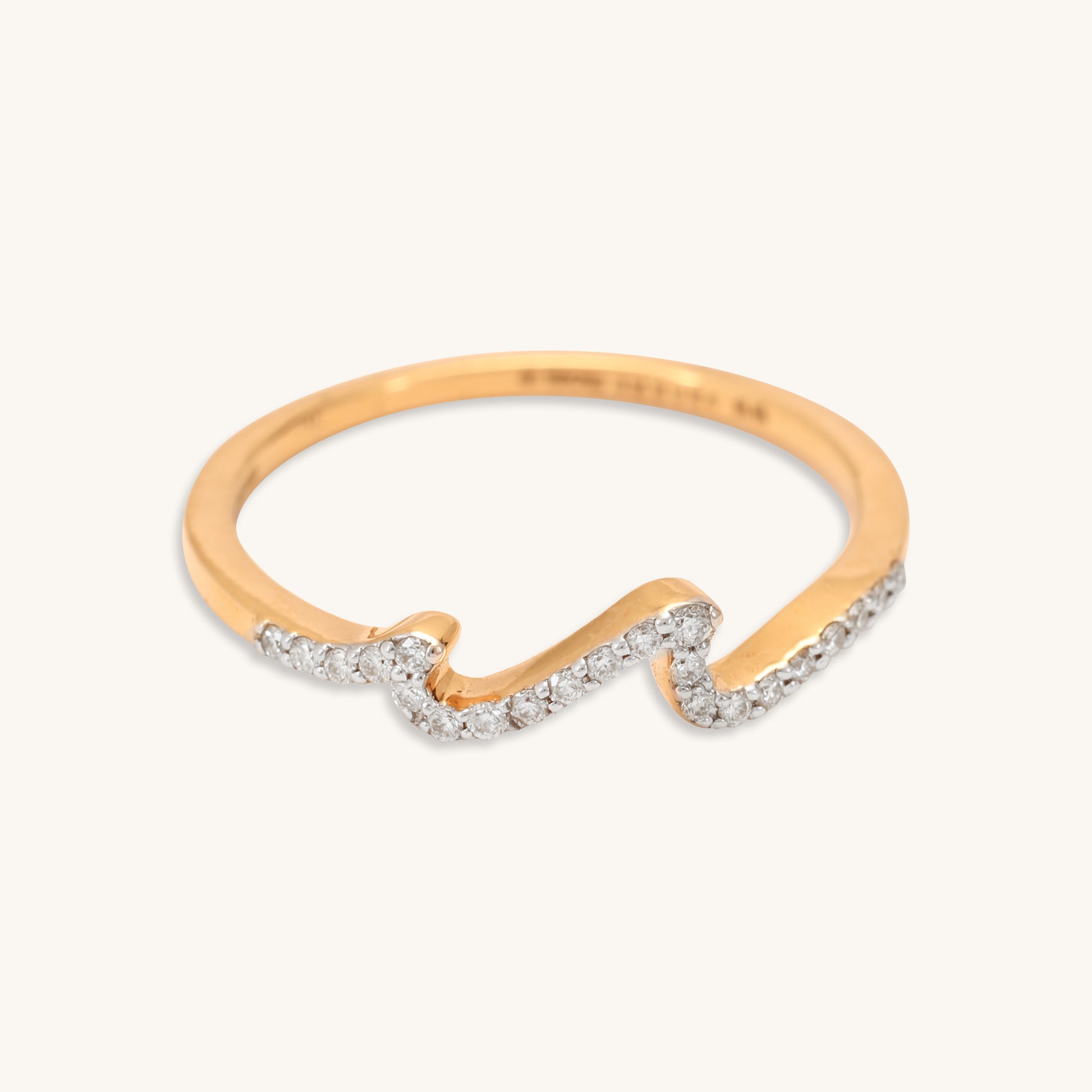 Caratly 18kt gold Wave Diamond Ring with 0.10ct diamond pave in a curved undulating wave band design under Rs. 30,000