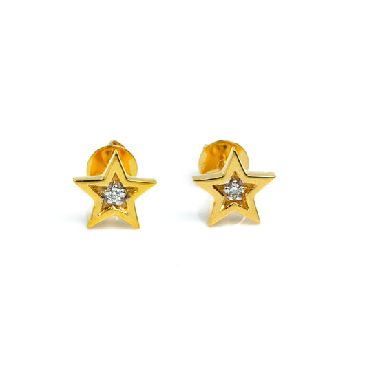 Caratly 18kt gold Star Diamond Earring with 0.02ct diamond center in a five-pointed star stud design. Perfect for gifting it to her under Rs. 20,000