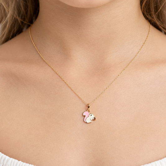 Gold chipmunk pendant with pink and white enamel detailing. Cute gifts under Rs. 20,000