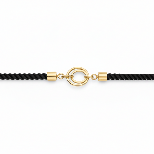 Black rope men's gold bracelet featuring an 18kt gold circle ring charm motif. An affordable gold gift for him under Rs. 15,000