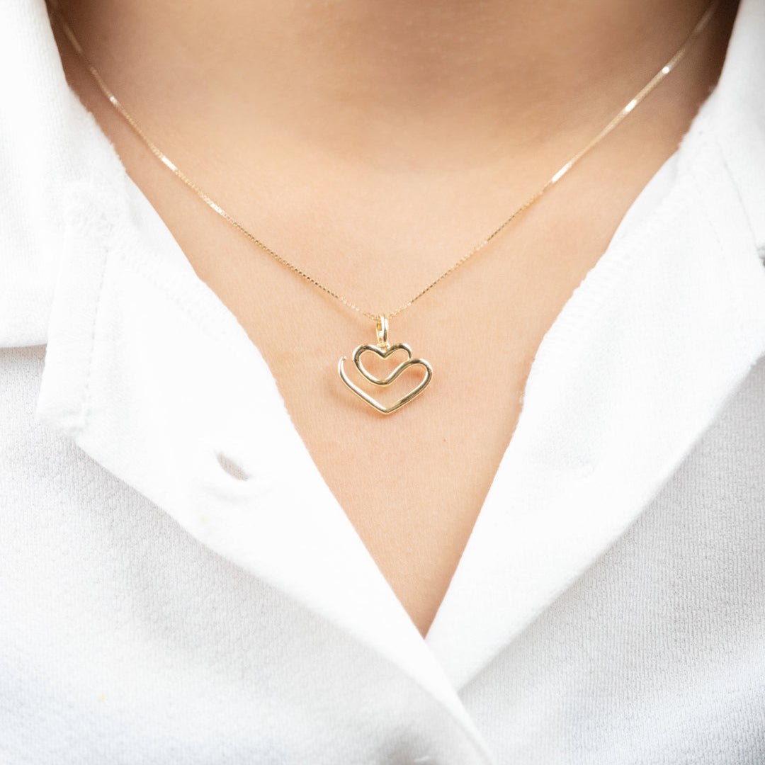 Caratly 18kt gold Draw Heart Pendant with continuous line open heart outline design under RS. 15,000